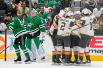 Vegas Golden Knights center Chandler Stephenson, second from right, celebrates his first period ...