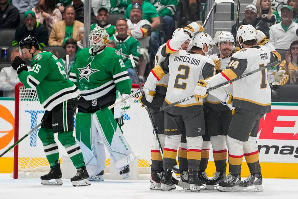 Vegas Golden Knights center Chandler Stephenson, second from right, celebrates his first period ...