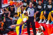 Los Angeles Lakers forward Anthony Davis (3) dunks the ball against the Indiana Pacers during t ...