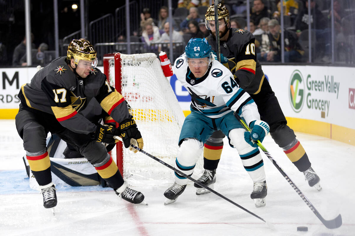 San Jose Sharks center Mikael Granlund (64) skates with the puck while Vegas Golden Knights def ...