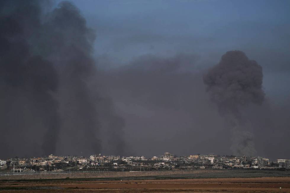 Smoke rises following an Israeli bombardment in the Gaza Strip, as seen from southern Israel, o ...