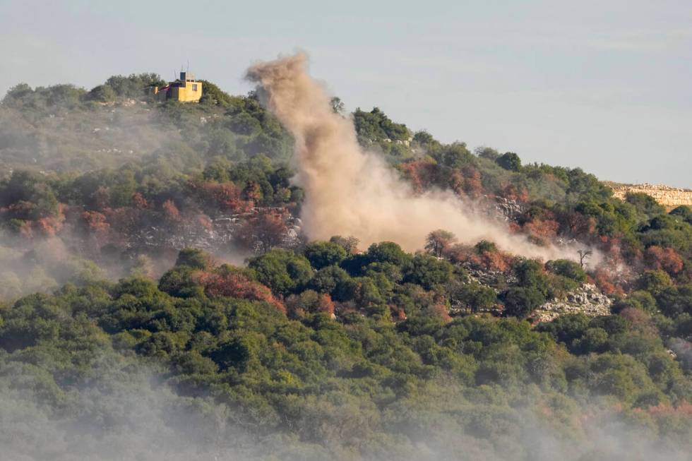 Smoke rises from Israeli artillery shelling on the outskirts of Yaroun, a Lebanese border villa ...