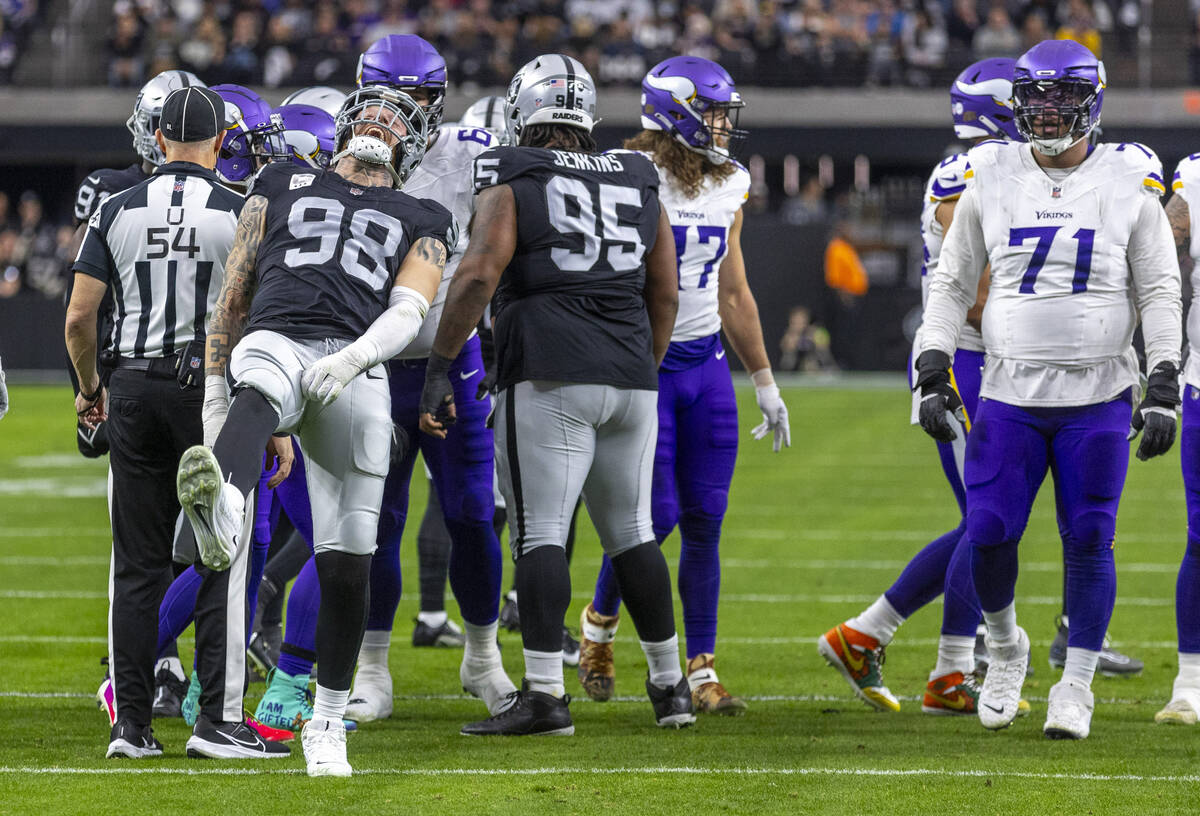 Raiders defensive end Maxx Crosby (98) celebrates a Minnesota Vikings stop during the first hal ...