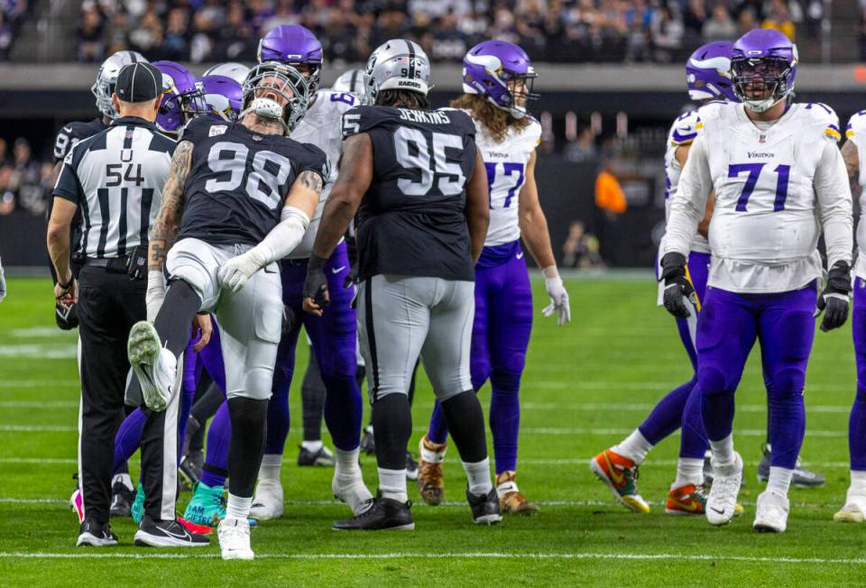 Raiders defensive end Maxx Crosby (98) celebrates a Minnesota Vikings stop during the first hal ...