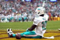 Miami Dolphins wide receiver Tyreek Hill (10) celebrates after scoring a touchdown during an NF ...