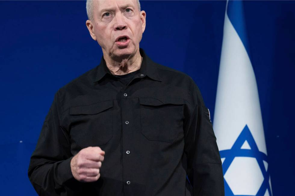 FILE - Israeli Defense Minister Yoav Gallant speaks to reporters prior to a meeting with U.S. S ...