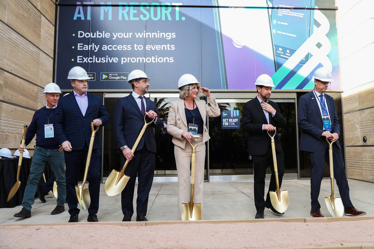 Henderson Mayor Michelle Romero, center, along with General Manager of M Resort Hussain Mahrous ...