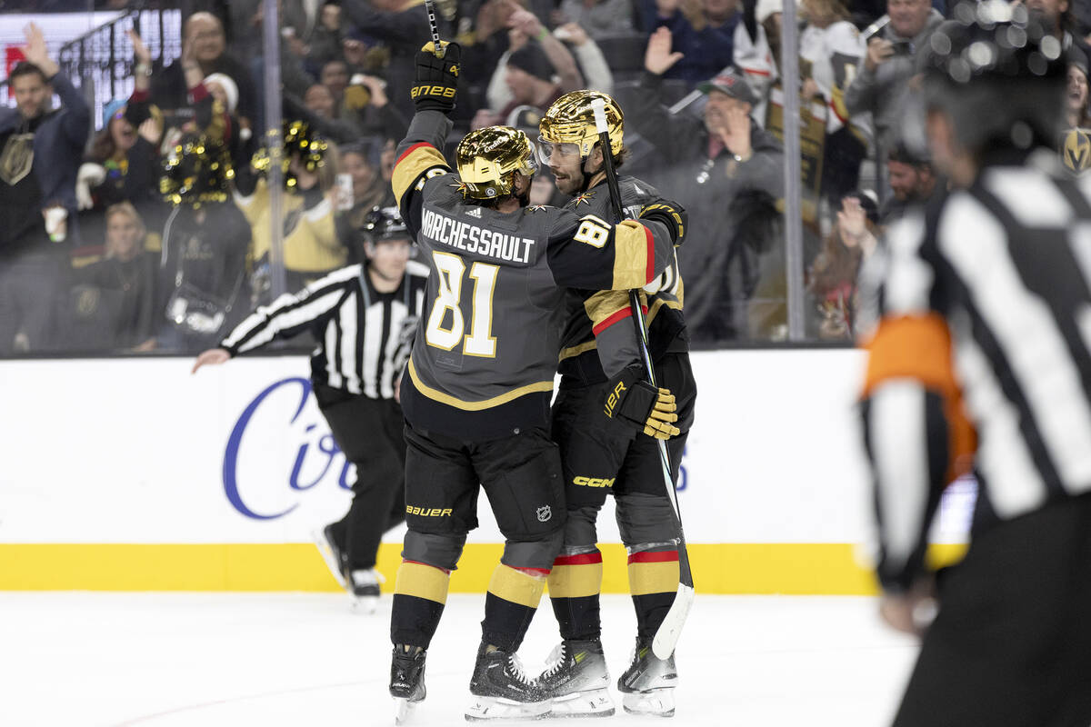 Vegas Golden Knights right wing Jonathan Marchessault (81) and center Chandler Stephenson, cent ...