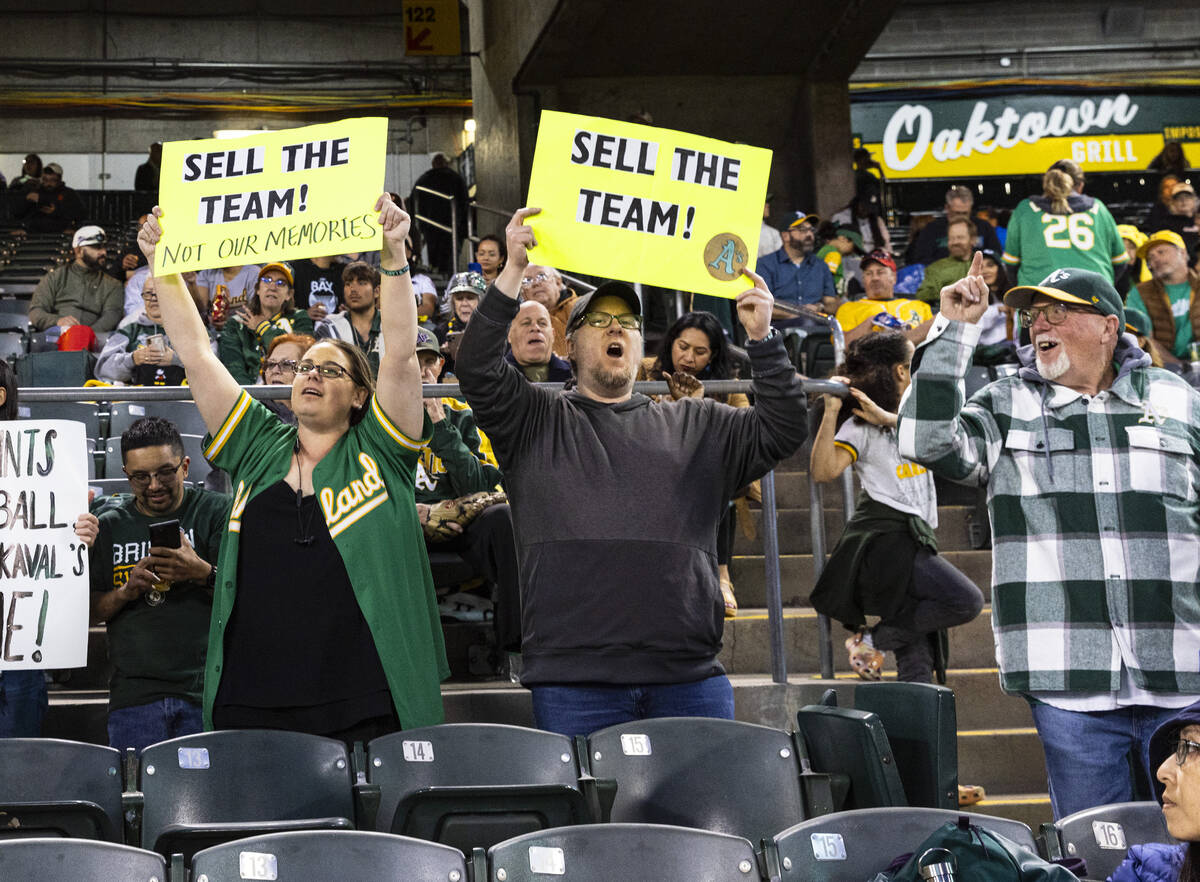 The Oakland A's fans protest at the Oakland Coliseum during a baseball game between the A&#x201 ...