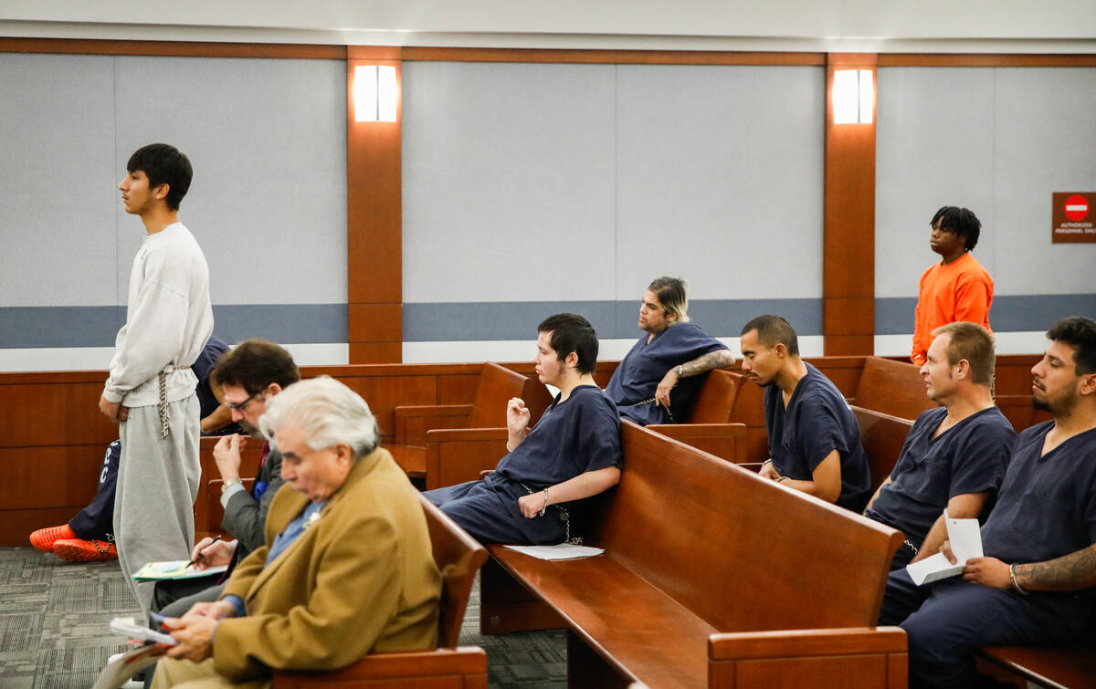 Damien Hernandez, 17, left, appears in court alongside Gianna Robinson, 17, on Tuesday, Dec. 12 ...