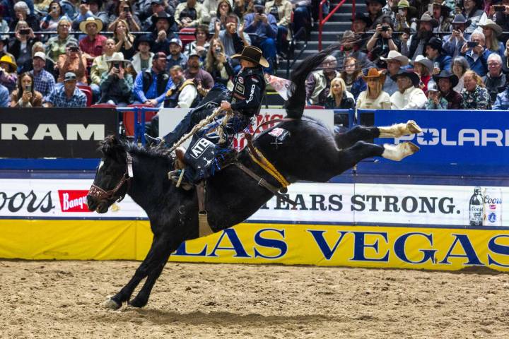 Zeke Thurston takes first place in Saddle Bronc Riding during day 5 action of the NFR at the Th ...