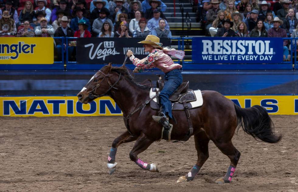 Summer Kosel takes first place in Barrel Racing during day 5 action of the NFR at the Thomas & ...