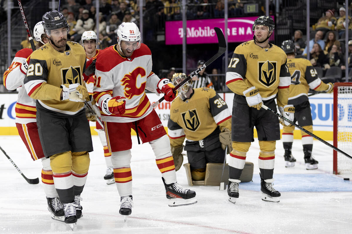 Flames center Nazem Kadri (91) celebrates his goal scored on Golden Knights goaltender Logan Th ...