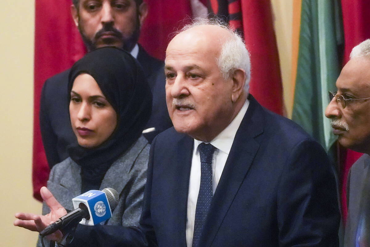 Palestinian United Nations Ambassador Riyad Mansour, second from right, speaks during a press c ...