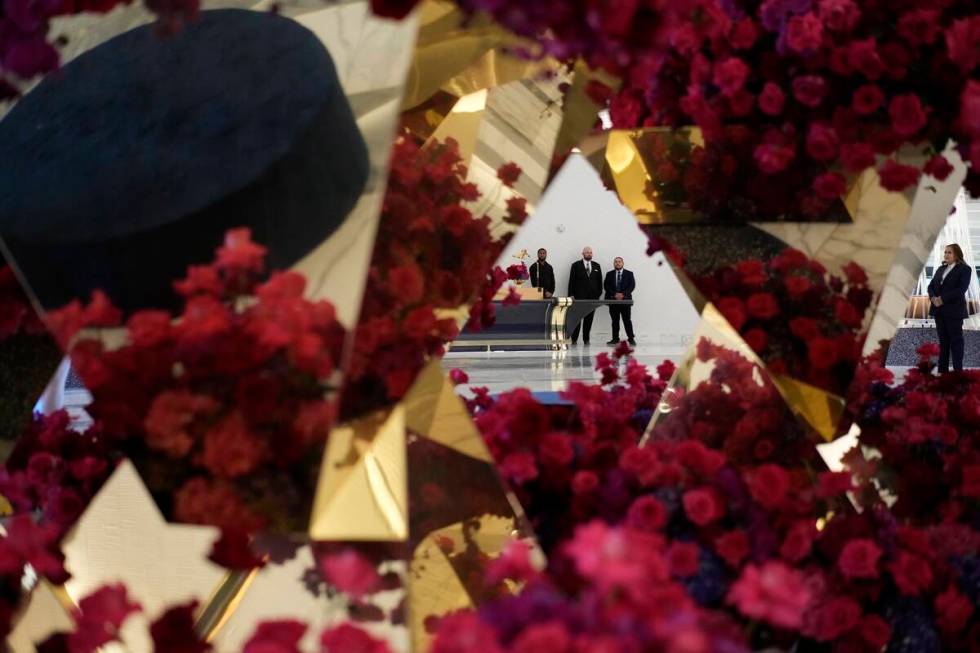 Workers stand in the lobby of the Fontainebleau Las Vegas hotel-casino Tuesday, Dec. 12, 2023, ...