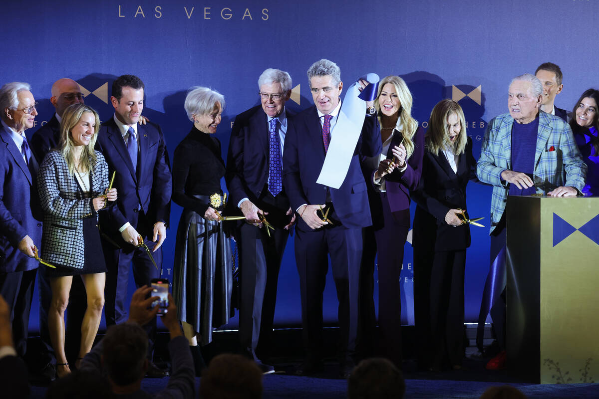 Fontainebleau resort-casino executives cut the ribbon for the opening at Fontainebleau Las Vega ...