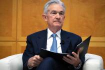 Federal Reserve Chairman Jerome Powell is introduced at the Jacques Polak Research Conference a ...