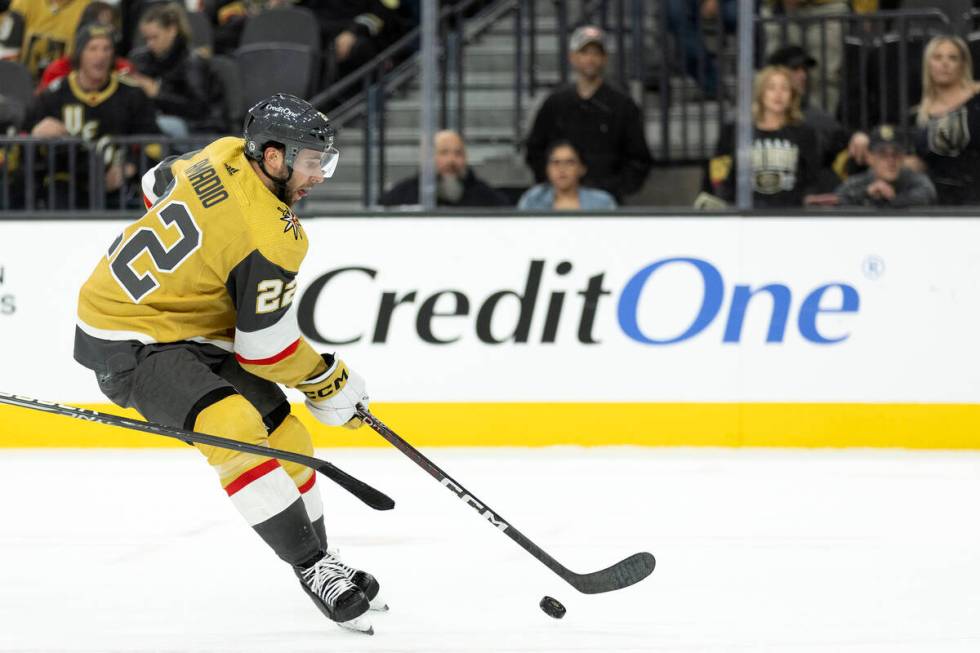 Golden Knights right wing Michael Amadio (22) winds up to attempt a goal during the first perio ...