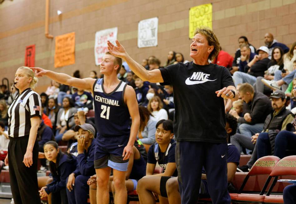 Centennial's head coach Karen Weitz, and Centennial's Kohlman Smith (21) gestures during the fi ...