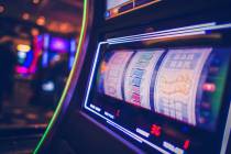 Spinning Drums of Slot Machine Inside the Casino. Modern Digital One Handed Bandit Game.(Getty ...