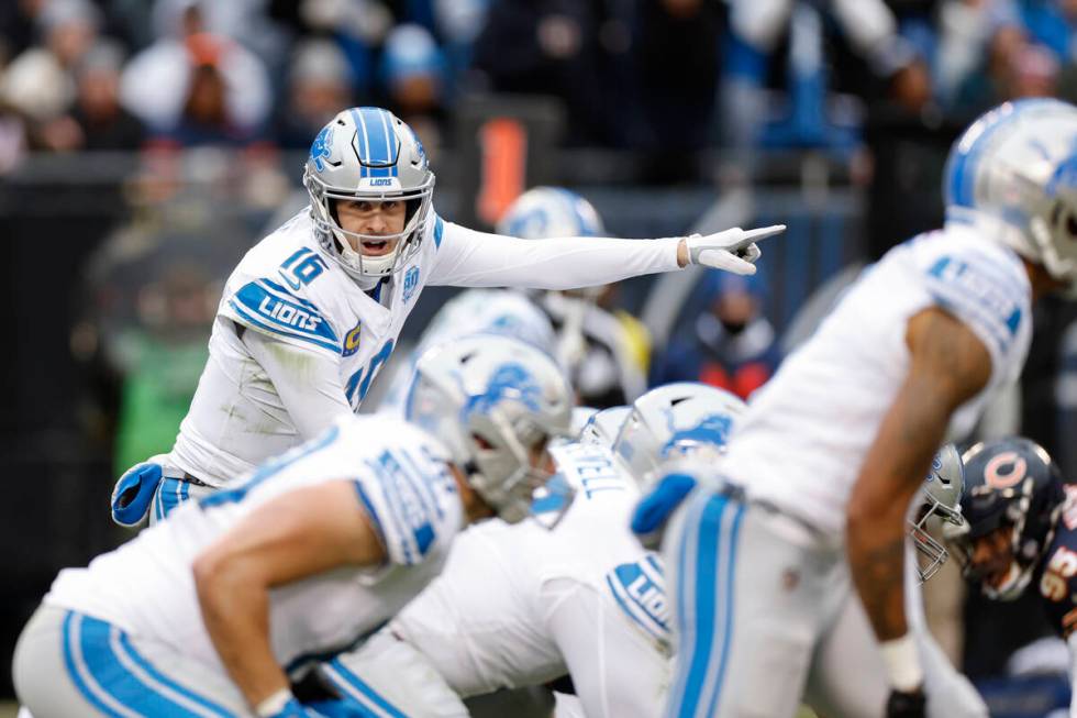 Detroit Lions quarterback Jared Goff (16) directs his teammates against the Chicago Bears durin ...