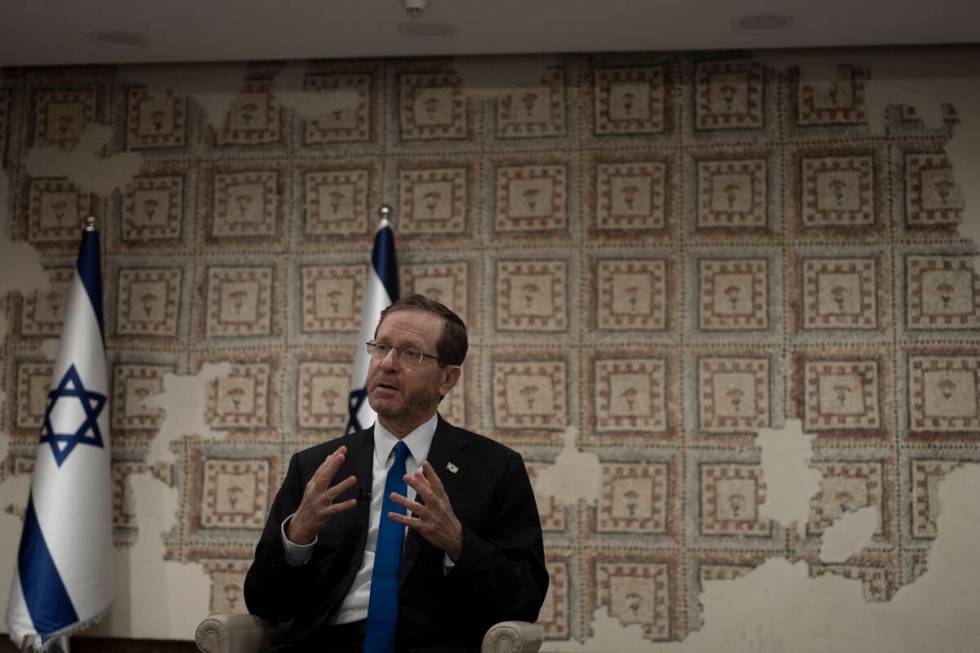 Israel's President Isaac Herzog speaks during an interview at his official residence in Jerusal ...