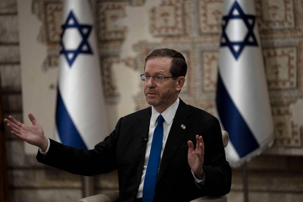 Israel's President Isaac Herzog speaks during an interview at his official residence in Jerusal ...