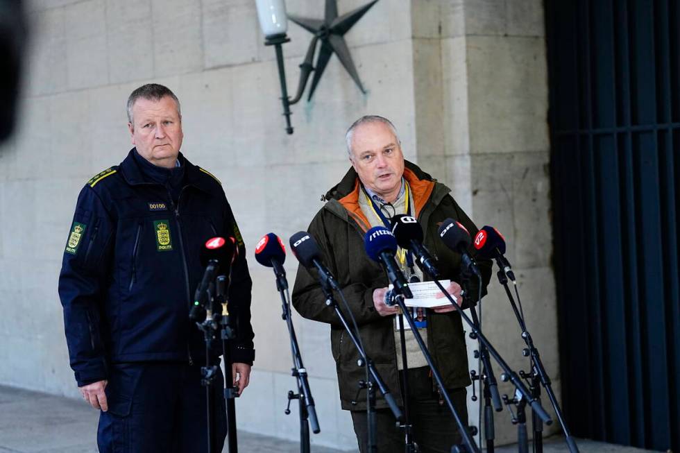 Chief police inspector and operational chief of PET Flemming Drejer, right, and senior police i ...