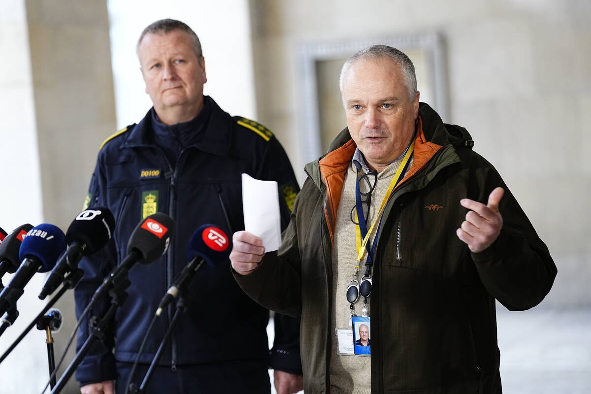 Chief police inspector and operational chief of PET Flemming Drejer, right, and senior police i ...