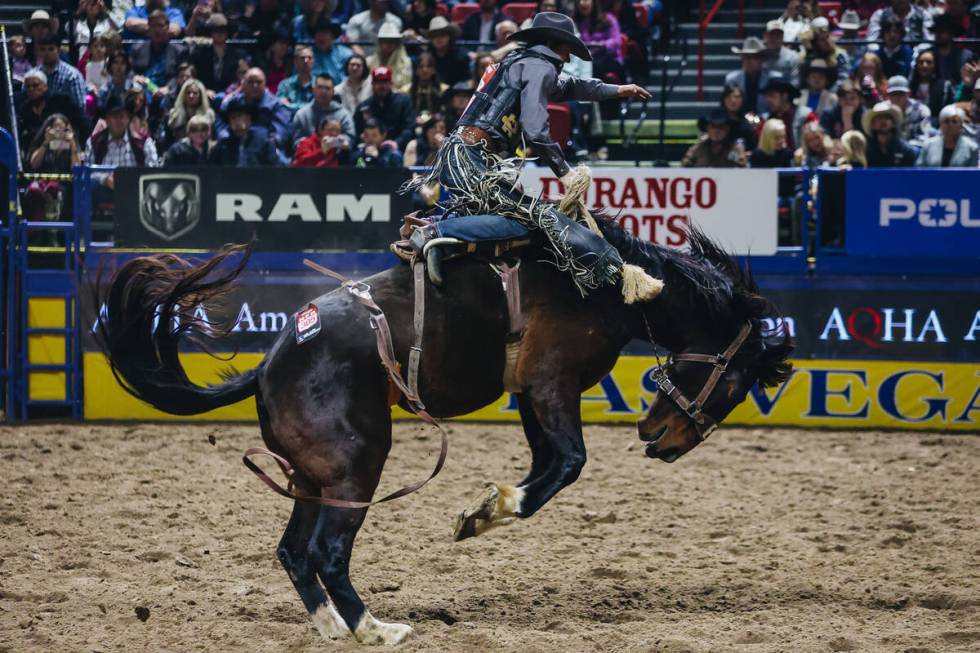 Ryder Sanford gets bucked by the horse during during the National Finals Rodeo at the Thomas &a ...