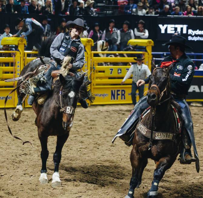 Ryder Sanford gets bucked by the horse during during the National Finals Rodeo at the Thomas &a ...