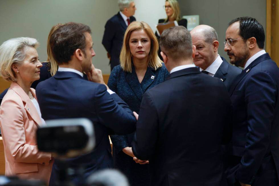 From left, European Commission President Ursula von der Leyen, Latvia's Prime Minister Evika Si ...