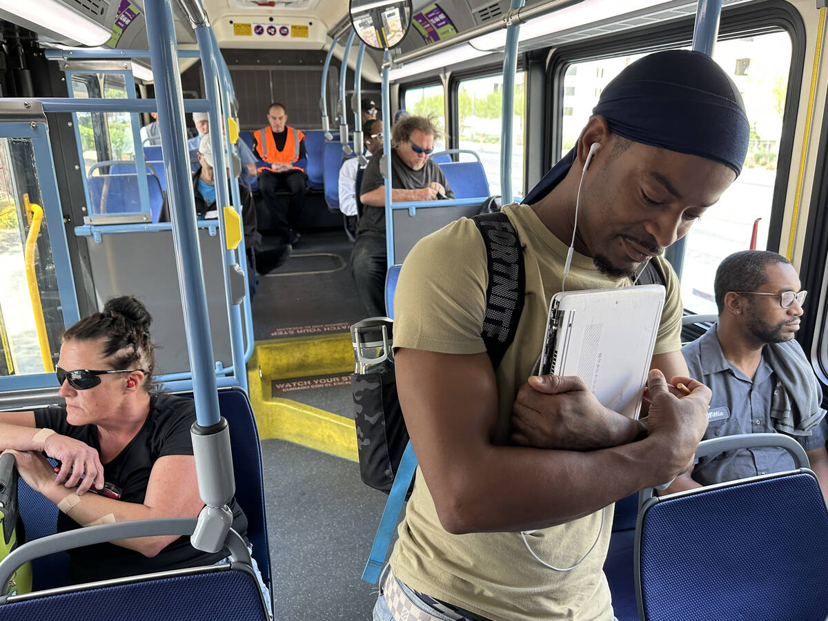 Rodney N. Tate Jr. rides the Regional Transportation Commission 109 Maryland Parkway bus in Las ...