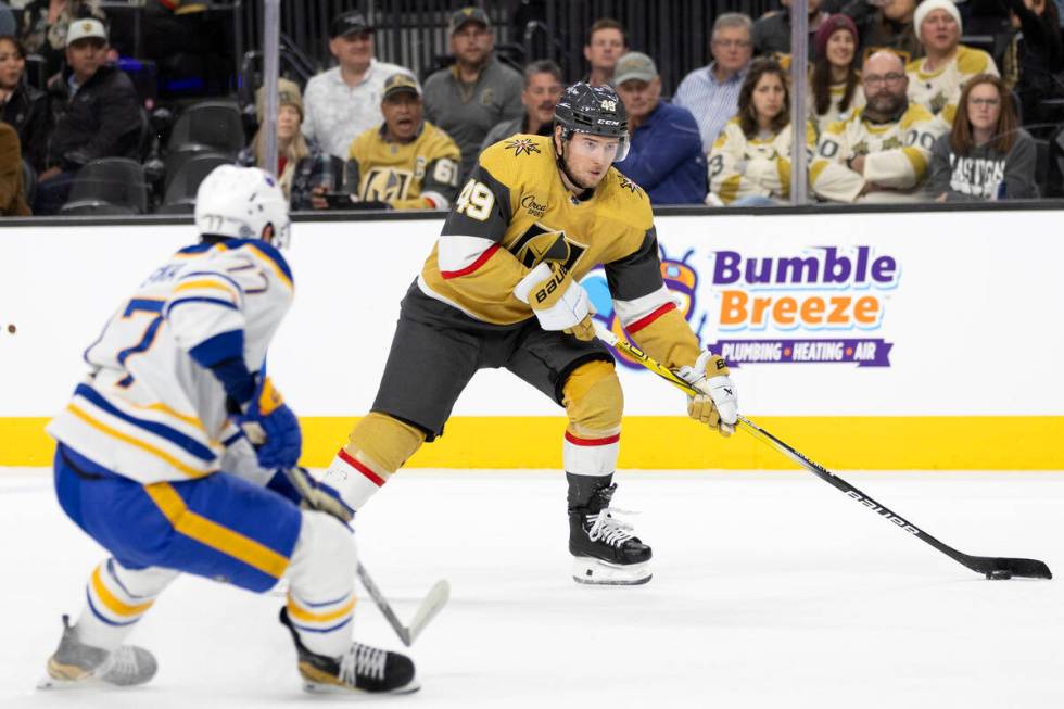 Golden Knights center Ivan Barbashev (49) winds up to take a shot on goal against Sabres right ...