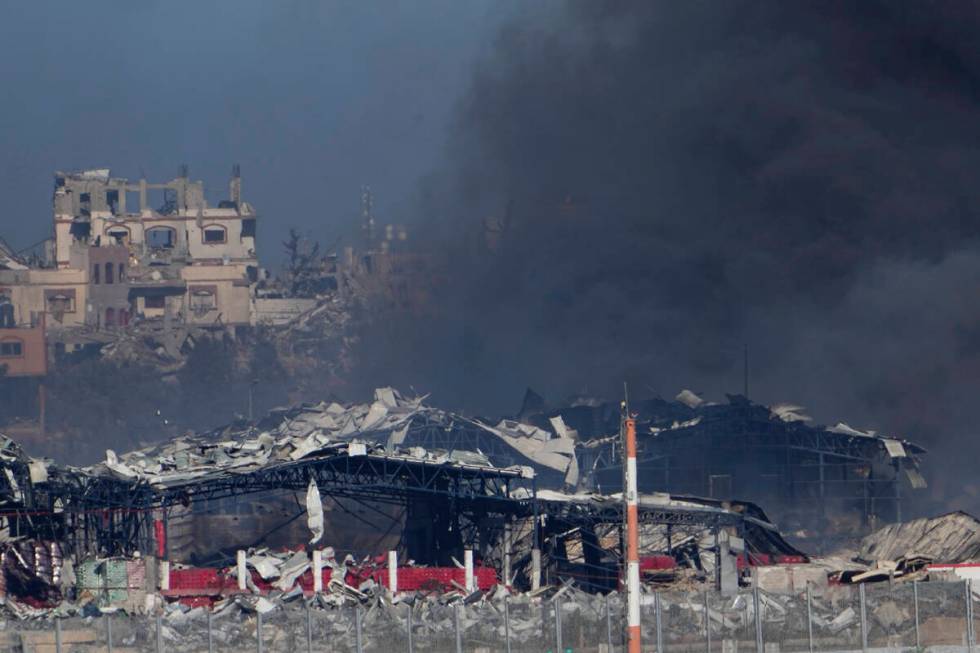 Smoke rises following an Israeli bombardment in the Gaza Strip, as seen from southern Israel , ...