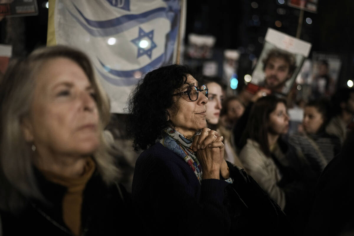 Families and supporters of Israeli hostages held by Hamas in Gaza attend a rally calling for th ...