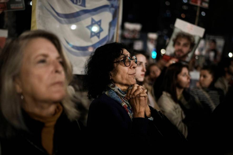 Families and supporters of Israeli hostages held by Hamas in Gaza attend a rally calling for th ...