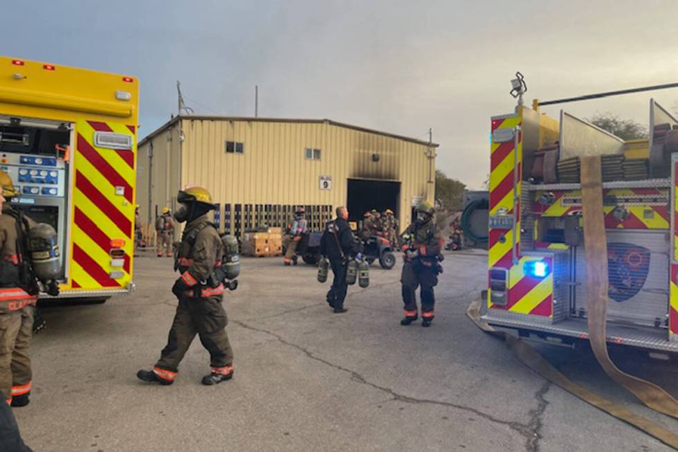Crews battle a fire Monday, Dec. 18, 2023, at a Clark County School District building on the 28 ...