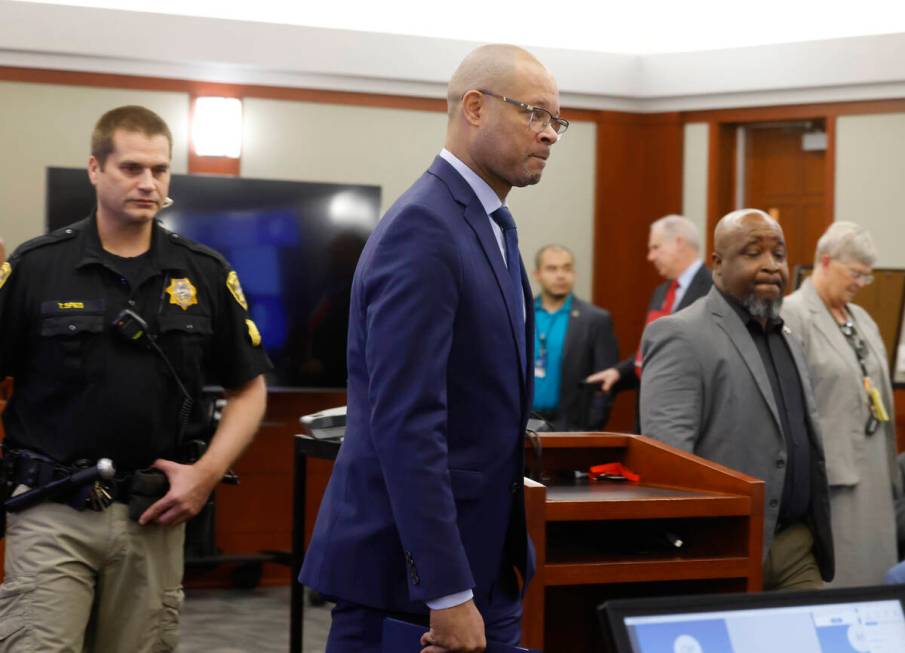 Nevada Attorney General Aaron Ford enters the courtroom where Nevada Republicans accused in a f ...