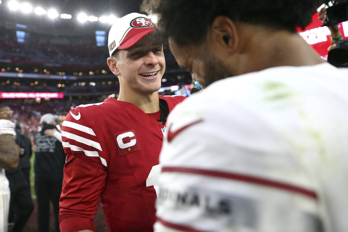 San Francisco 49ers' Brock Purdy, left, greets Arizona Cardinals' Kyler Murray, right, after th ...