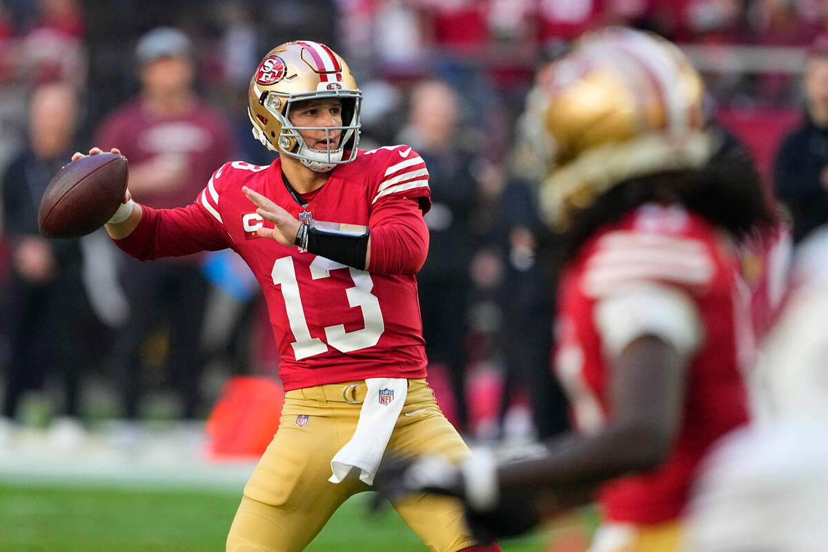 San Francisco 49ers quarterback Brock Purdy passes against the Arizona Cardinals during the fir ...