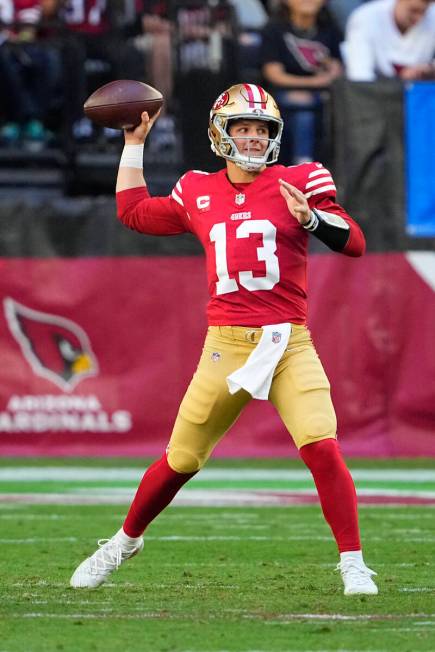 San Francisco 49ers quarterback Brock Purdy (13) passes against the Arizona Cardinals during th ...