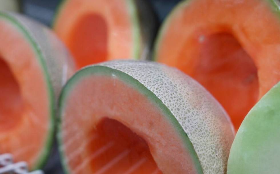 Cantaloupe halves are displayed for sale at a supermarket in New York on Tuesday, Dec. 12, 2023 ...