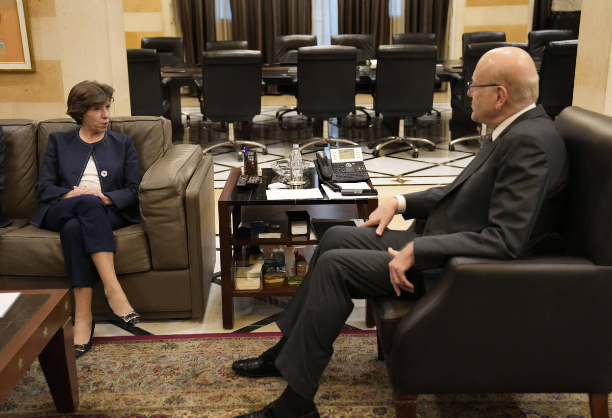 French Foreign Minister Catherine Colonna, left, meets with Lebanese caretaker Prime Minister N ...