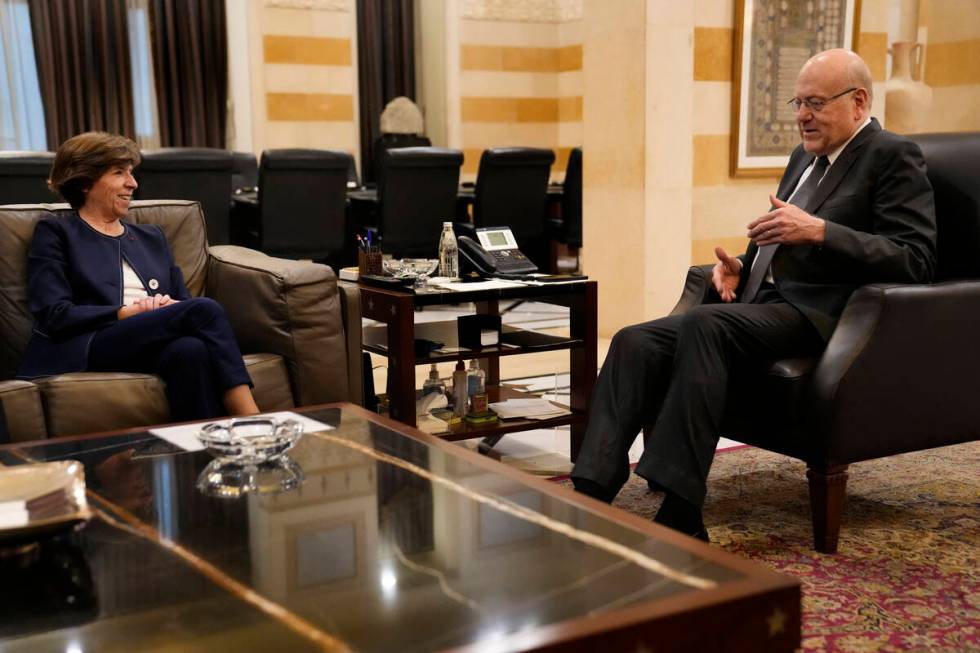 French Foreign Minister Catherine Colonna, left, meets with Lebanese caretaker Prime Minister N ...