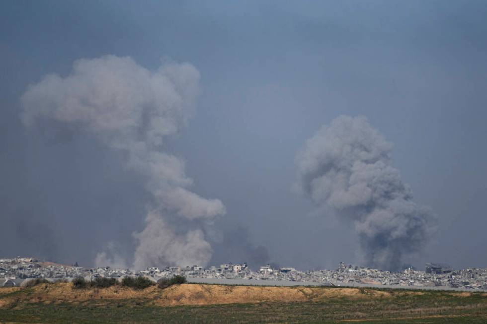 Smoke rises following an Israeli bombardment in the Gaza Strip, as seen from southern Israel, W ...