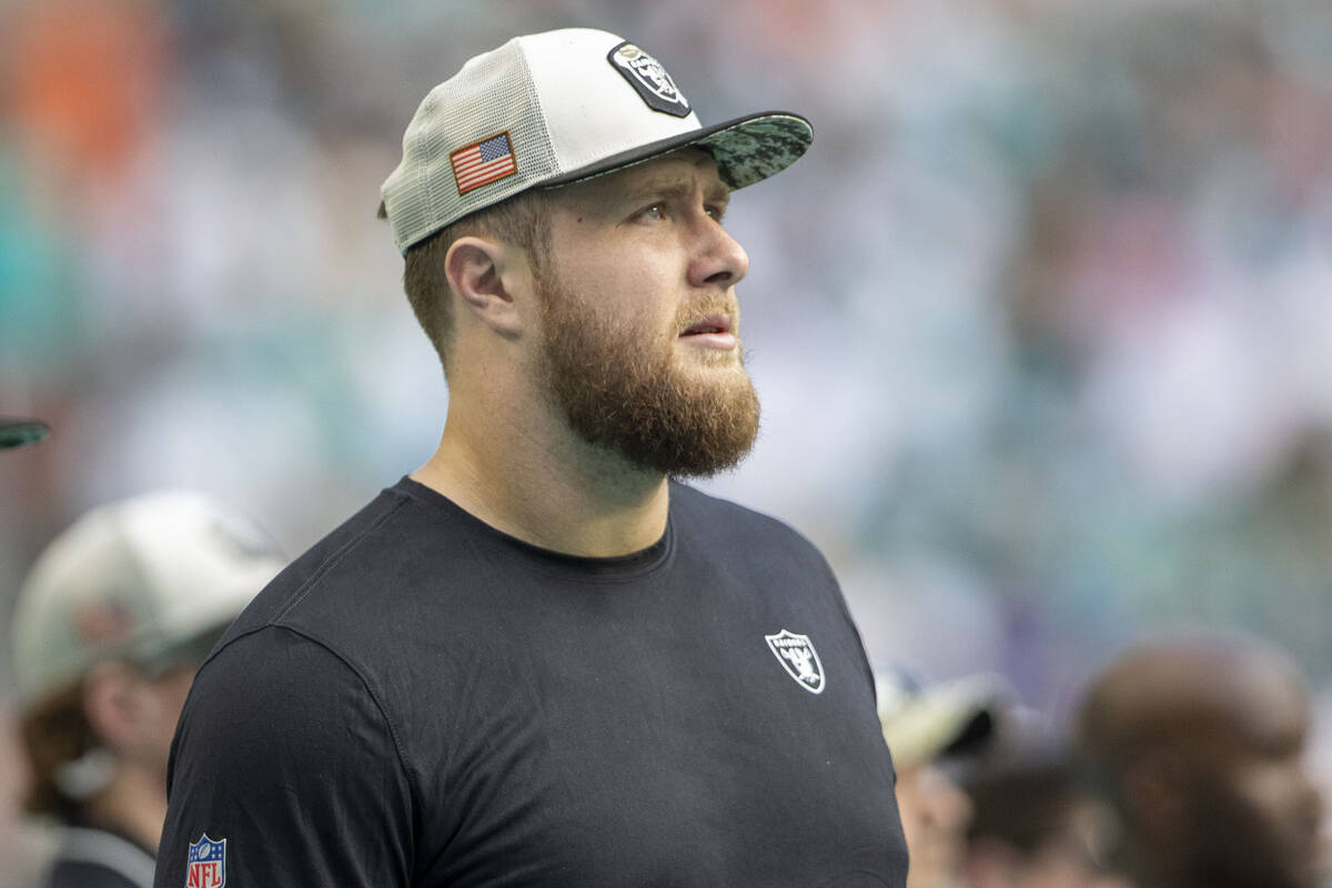 Raiders offensive tackle Kolton Miller watches the team play against the Miami Dolphins during ...