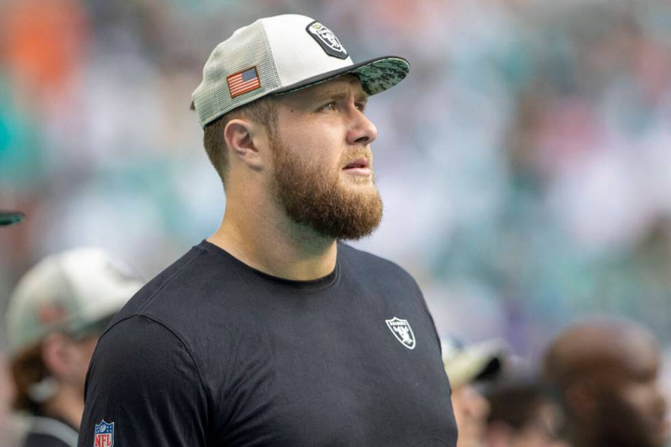 Raiders offensive tackle Kolton Miller watches the team play against the Miami Dolphins during ...