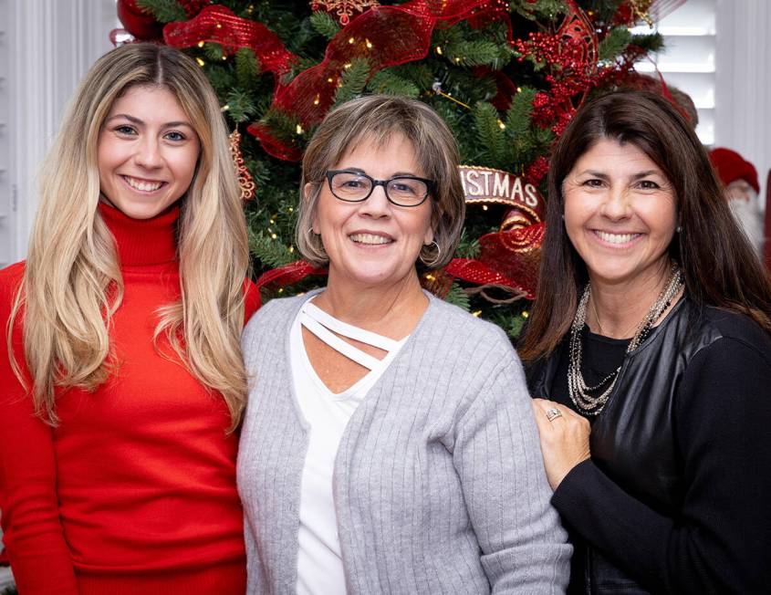 Homeowner Kristi Savacool, middle, with designers Laura and Jordan Sullivan. (Tonya Harvey/Real ...