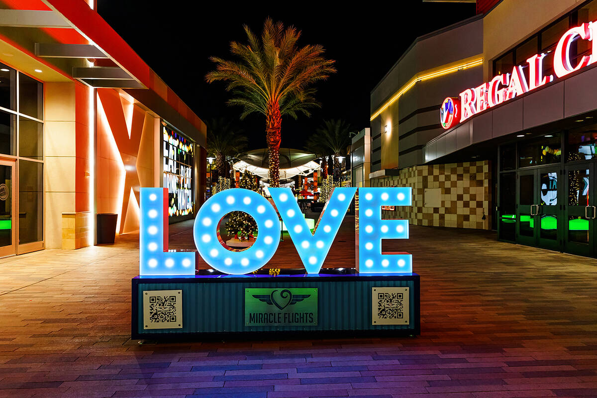 Downtown Summerlin features seven lighted signs of words that symbolize the holiday spirit. The ...